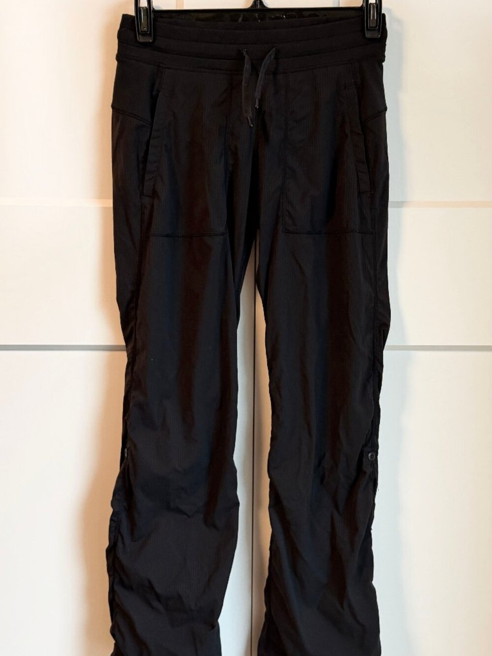 Aviva Black Studio to street pants with button adjustable length Size 12